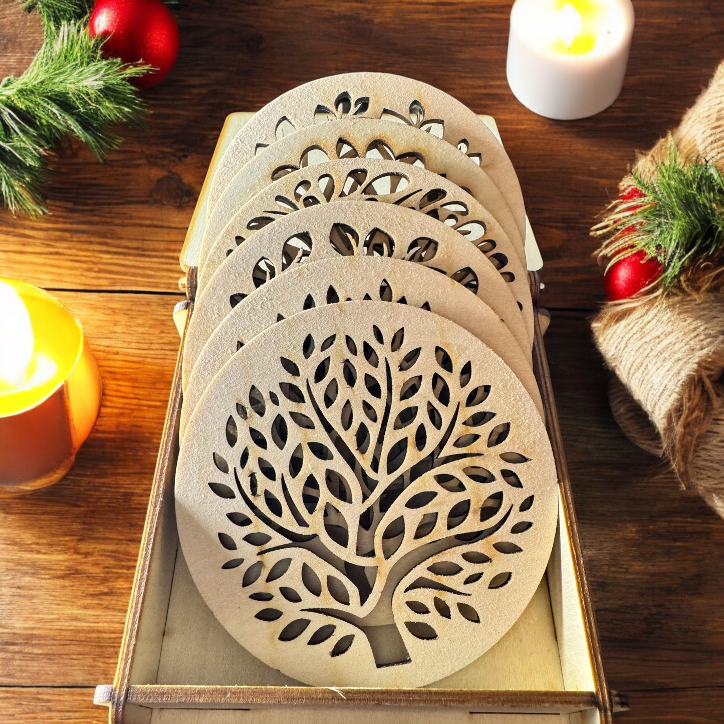 6 “tree of life” coasters and their storage box